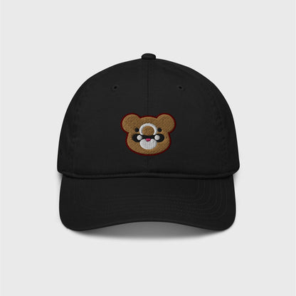 A classic black cap featuring an embroidered bear head shape of Gouda in gold, with black and white marks and lined in dark red.