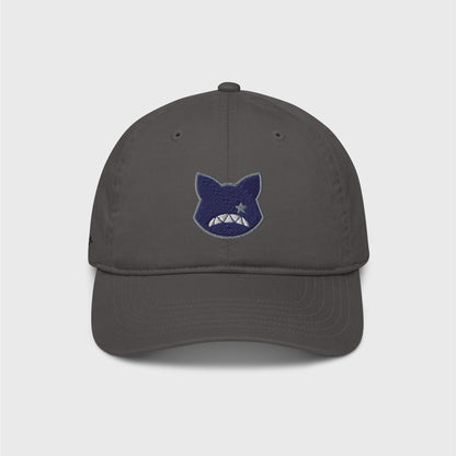 A classic grey cap featuring an embroidered navy logo shaped as a cat’s head, lined in grey, showing only a right grey eye the shape of a star and a upside down fanged white smile.