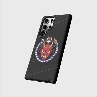 A Samsung case with a black gradient going from darker on the top to brighter on the bottom, featuring a round design with a red oni mask in the center and a frame made of Itto’s outfit details and abilites. His name shows in gold Japanese characters at the bottom left of the design. Soft golden lines cross the top and bottom of the case diagonally.